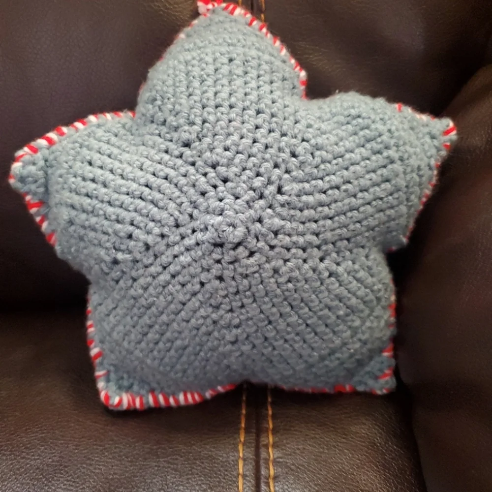 Crocheted star pillow or ornament